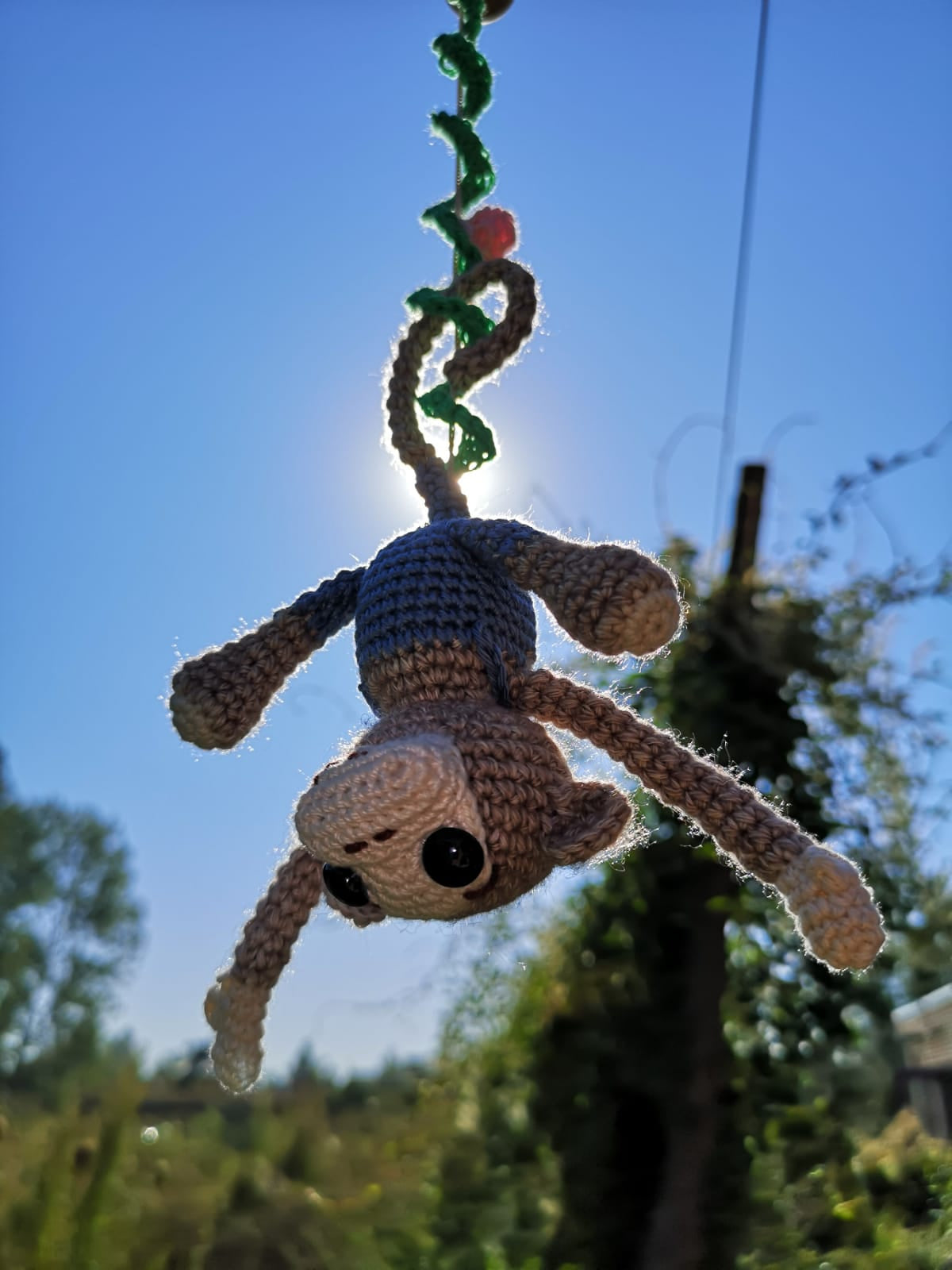 Appie aap — gemaakt met Haakpatroon Monkey Madness Babymobiel