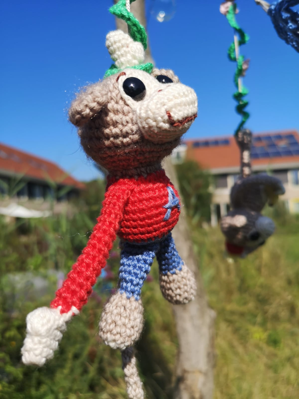 Anton aap — gemaakt met Haakpatroon Monkey Madness Babymobiel