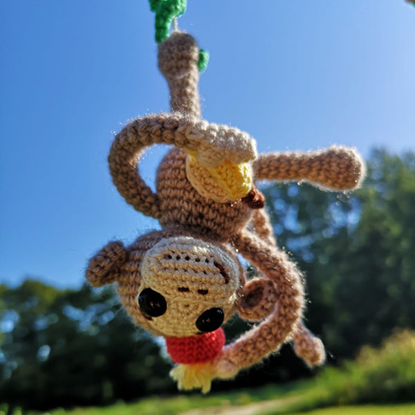 Alex aap — gemaakt met Haakpatroon Monkey Madness Babymobiel