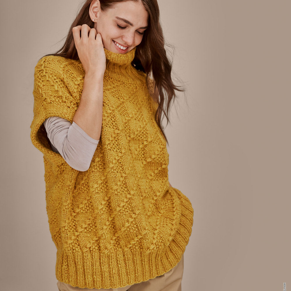 roze gebreid kussen en bijpassende plaid op bed als inspiratie voor Lana Grossa Cool Merino Big 231 Roze - Lana Grossa Cool Merino Big 201 Ruw Wit