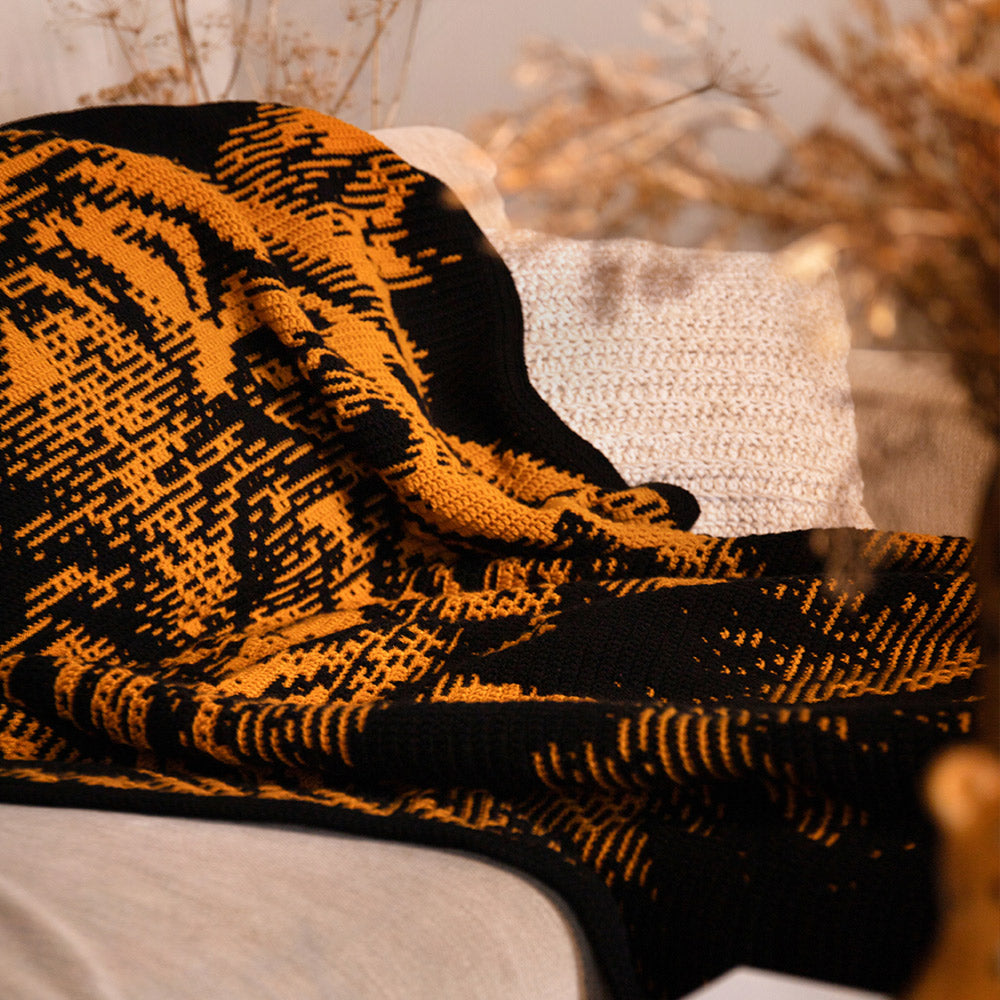 Detail van de Ravishing Roar tijgerdeken in mozaiekhaakwerk
